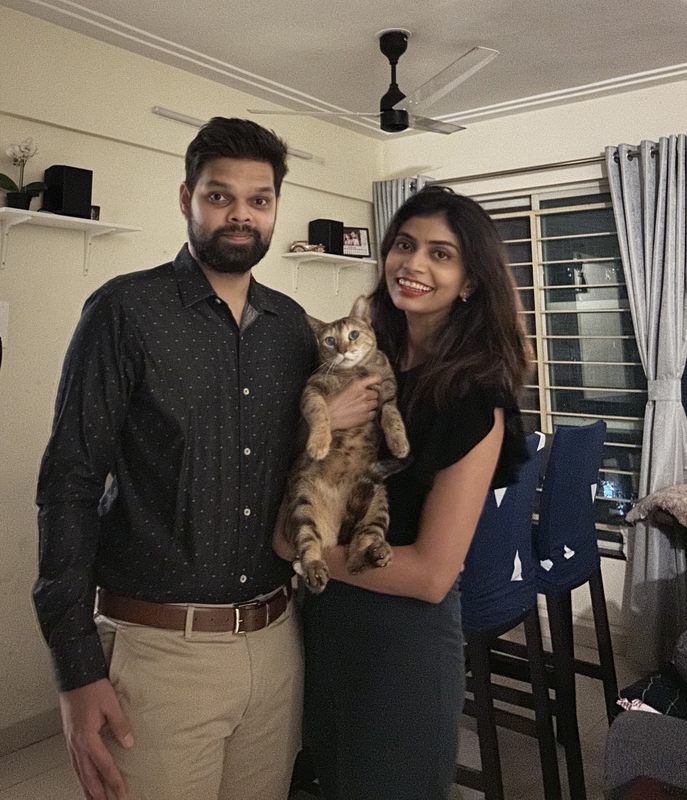 Ruhama and Sid with Hissie, one of their cats