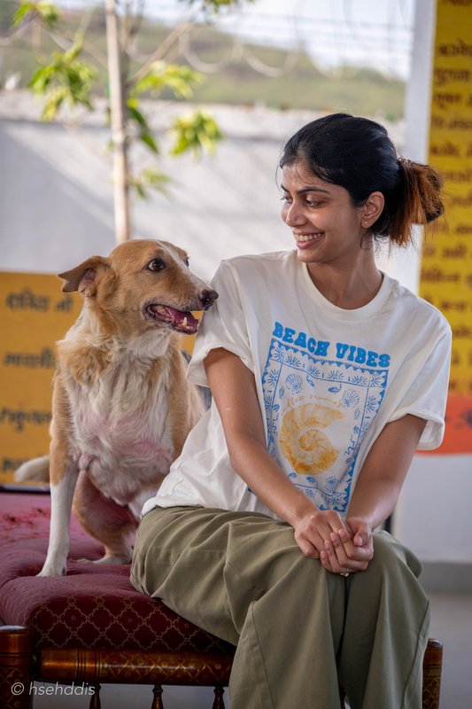 Ruhama with Goatface Senior, a shelter dog
